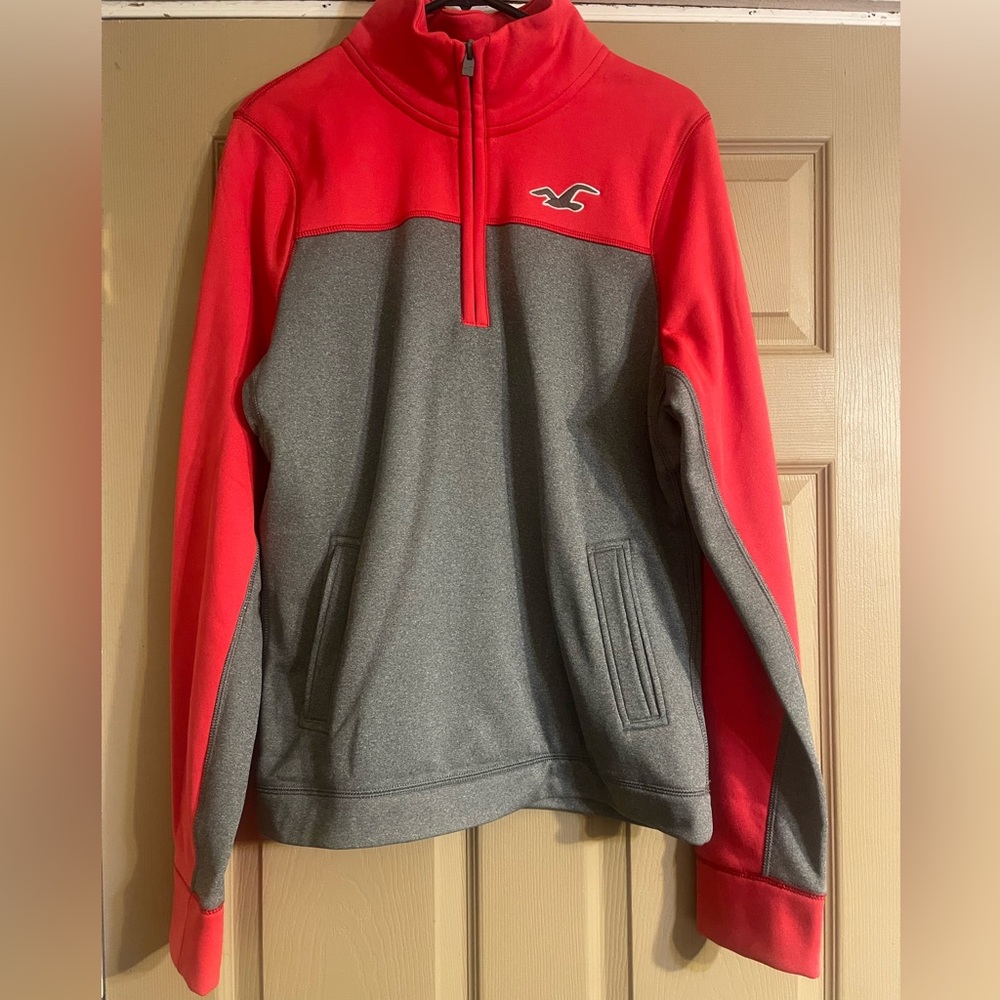 Men’s xl Hollister fuchsia half zip long sleeve shirt.